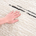 Riad Black Striped White Rug with Tassels