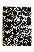 SQUARES – Black and White Patagonian Cowhide Rug