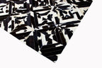 SQUARES – Black and White Patagonian Cowhide Rug